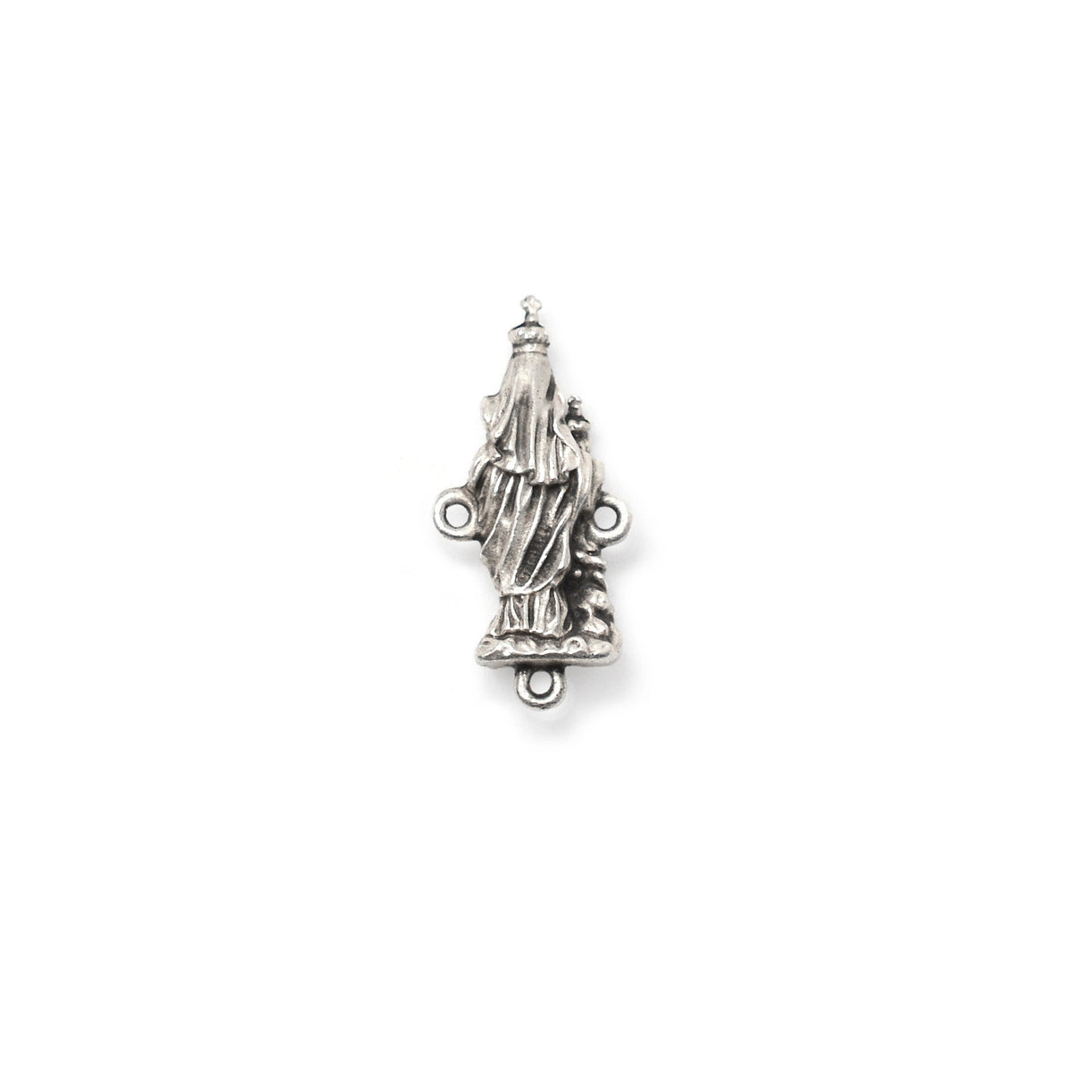 Silver religious pendant on a white background