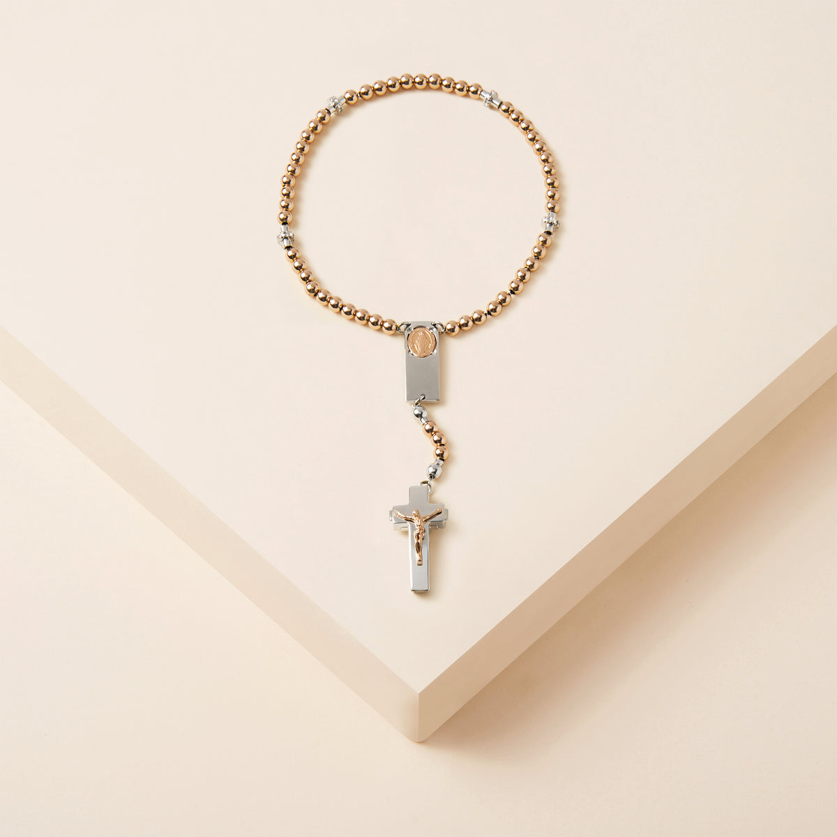 Handcrafted rosary bracelet with rose gold Hail Mary beads