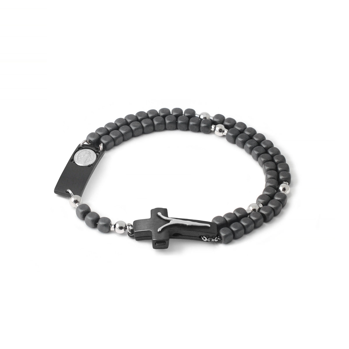A black rosary bracelet with matte hematite beads and a modern artistic crucifix with black rhodium plating, sterling silver details, and a visible patent tag.