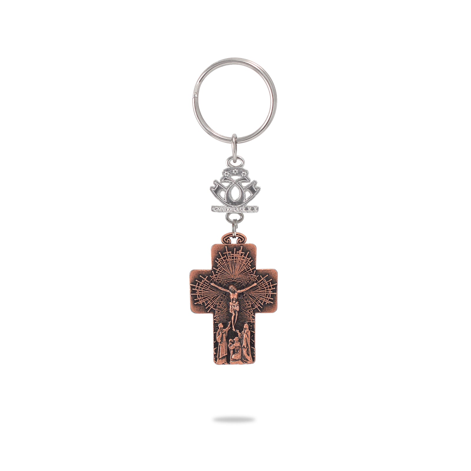 A key chain featuring a bronze-colored metal crucifix with the figure of Jesus Christ on it, attached to a ring and a decorative emblem.